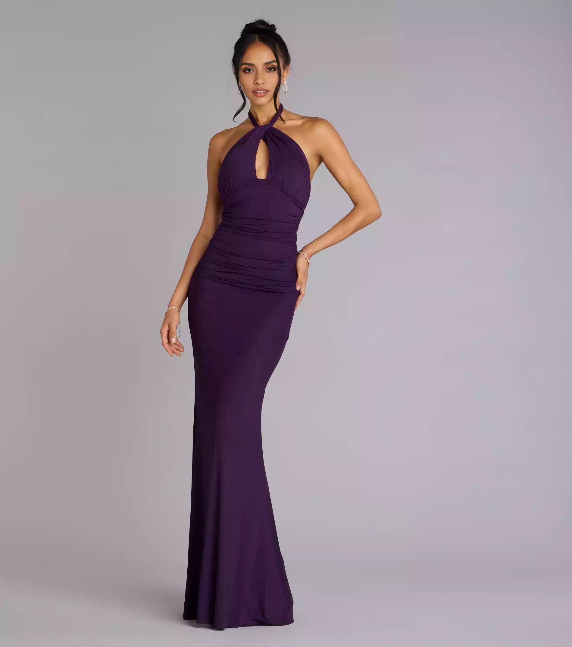 Charming sleeveless twisted neck hanging collar with hollowed out backless suspender and Prom Dresses featuring a mermaid on the ground
