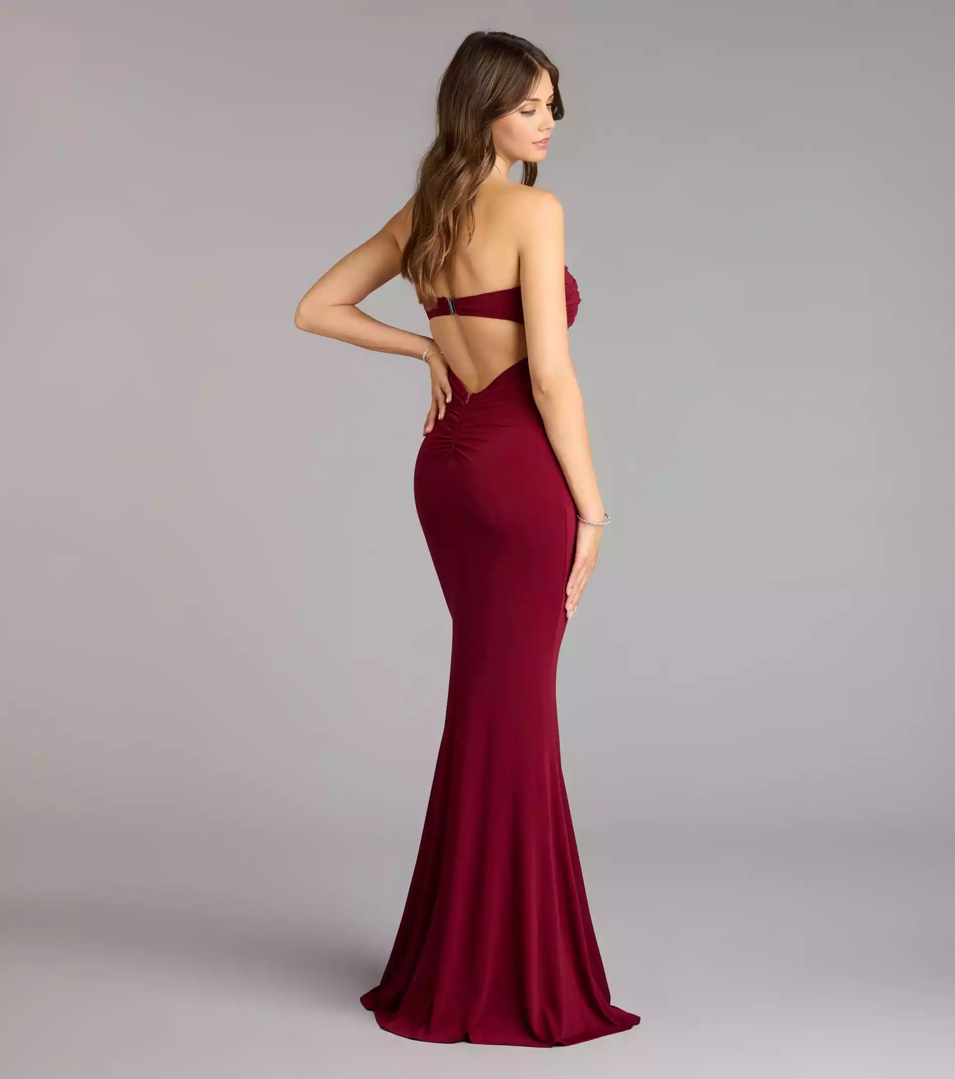 Charming smooth knit strapless heart-shaped neckline twisted corset with hollowed out back featuring mermaid and floor Prom Dresses