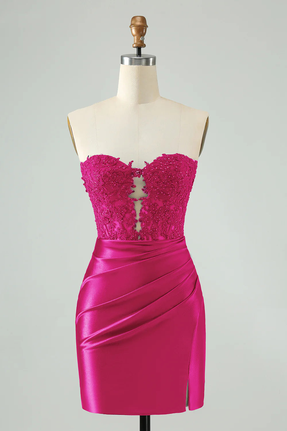 Fuchsia bodycon homecoming dress with sweetheart neckline and beaded corset detail.