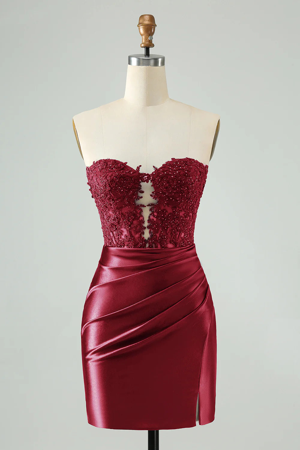 Burgundy bodycon homecoming dress with sweetheart neckline and beaded corset.