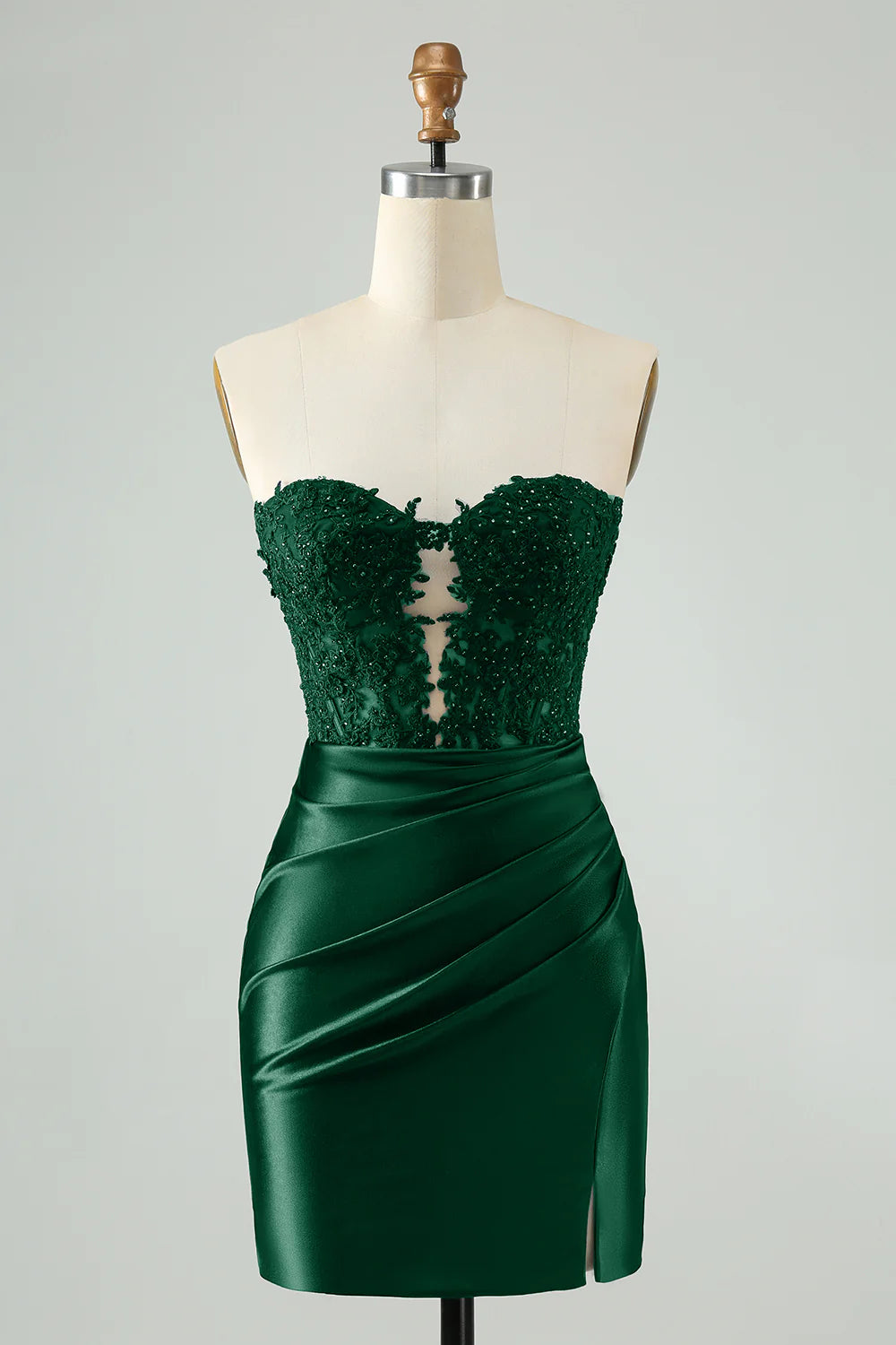 Dark green bodycon homecoming dress with sweetheart neckline and beaded corset.