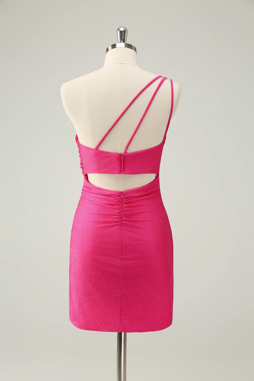 Back view of the hot pink one-shoulder pleated short dress.