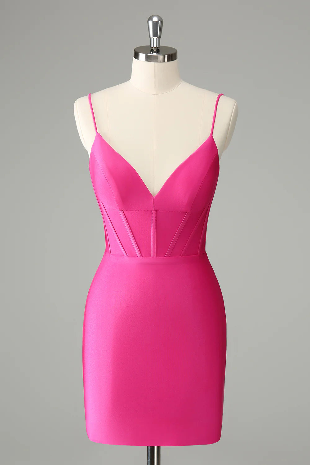 Fuchsia A-line homecoming dress with sweetheart neckline and spaghetti straps.