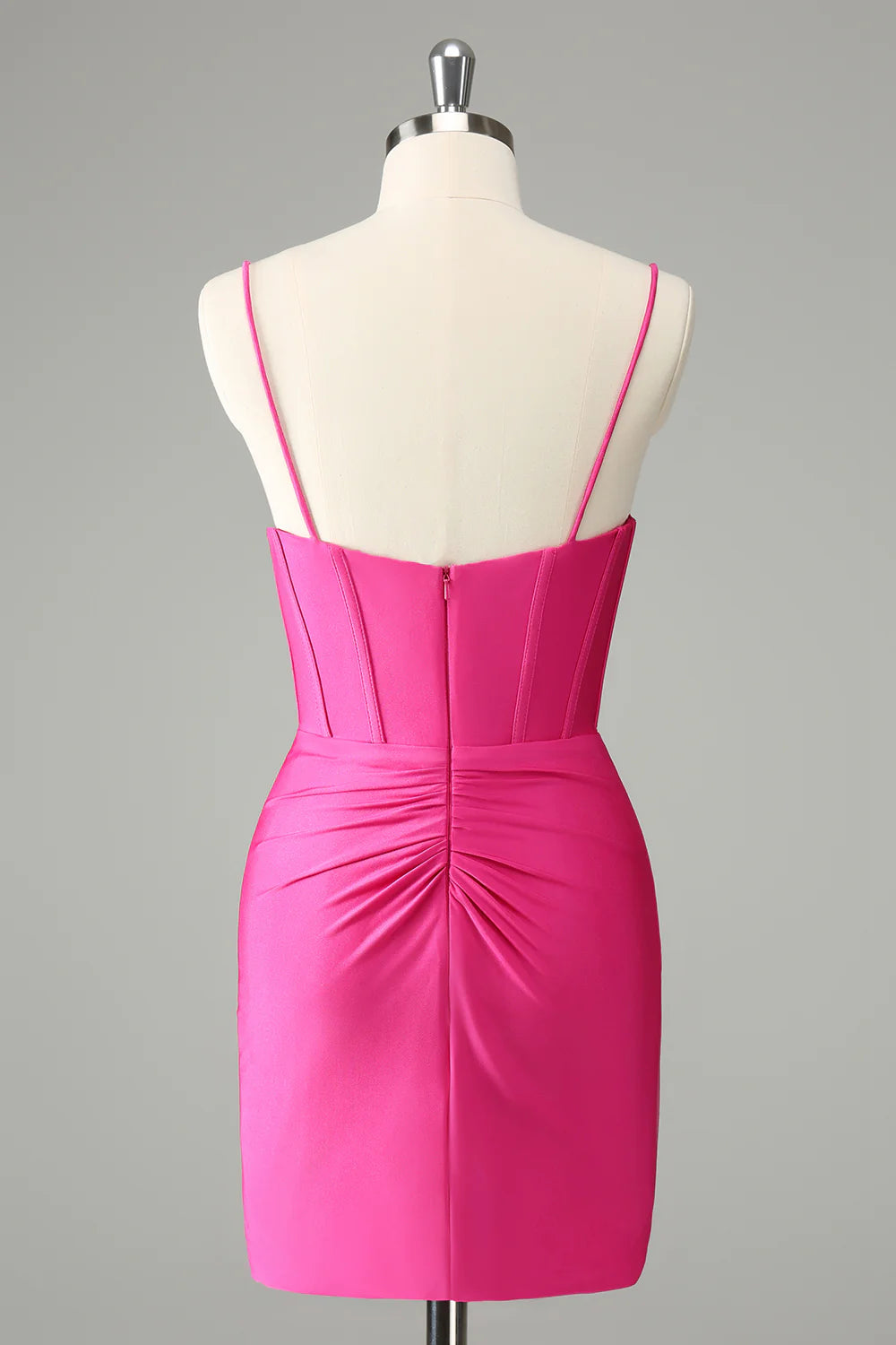 Back view of fuchsia pleated short homecoming dress.