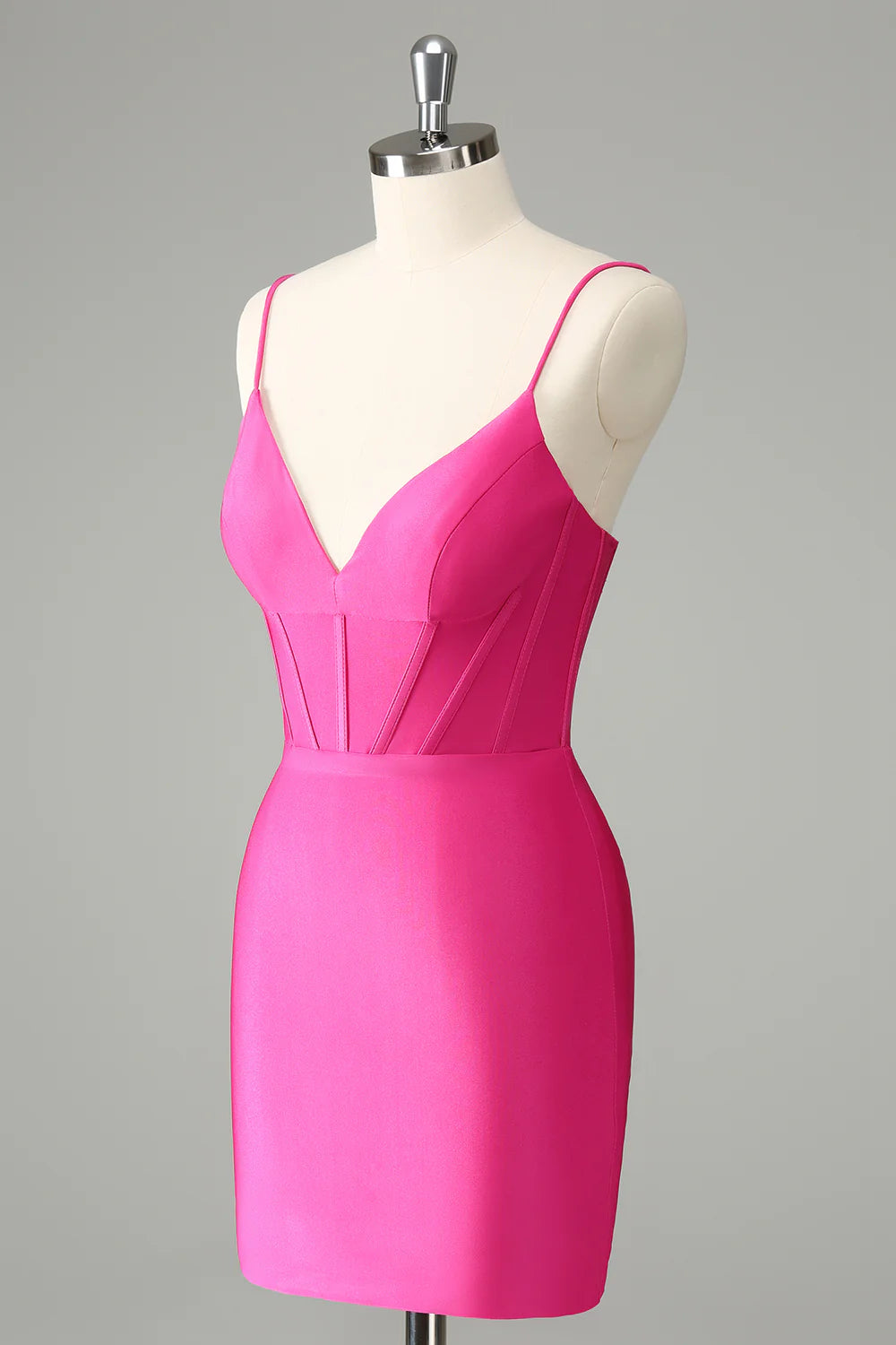 Side view of fuchsia A-line spaghetti strap dress.