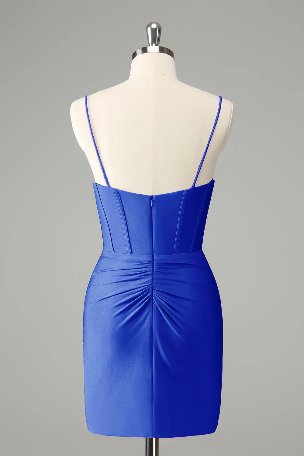 Back view of royal blue pleated short homecoming dress.