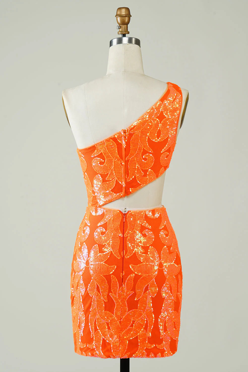 Back view of orange glitter one-shoulder homecoming dress.