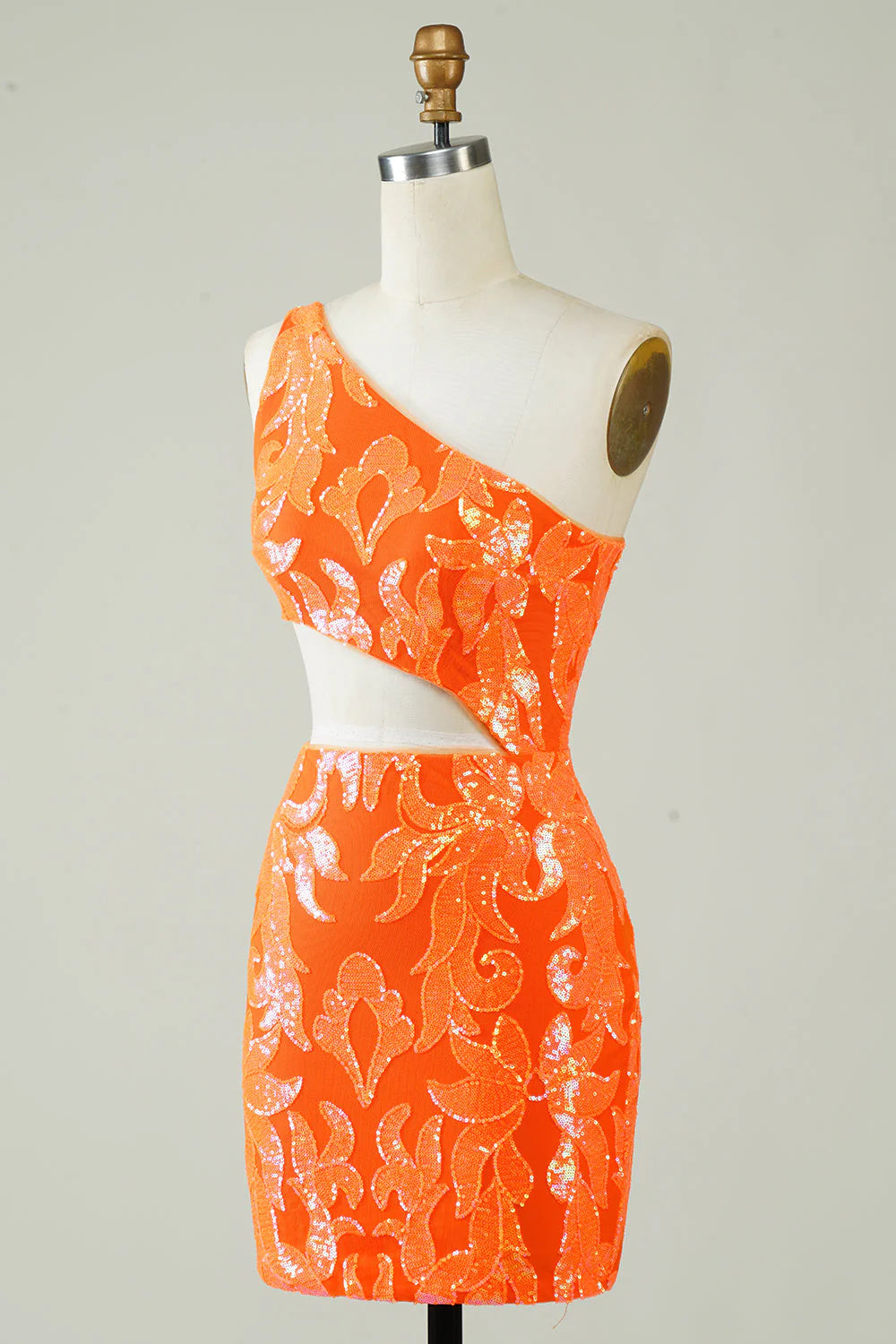 Side view of orange one-shoulder glitter dress for homecoming.