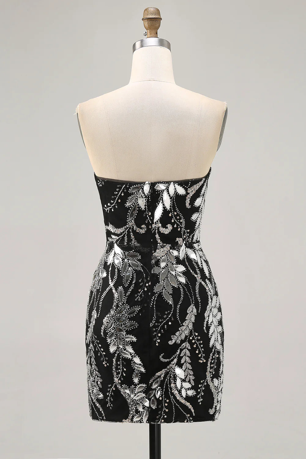Back view of a black strapless bodycon homecoming dress with beading.