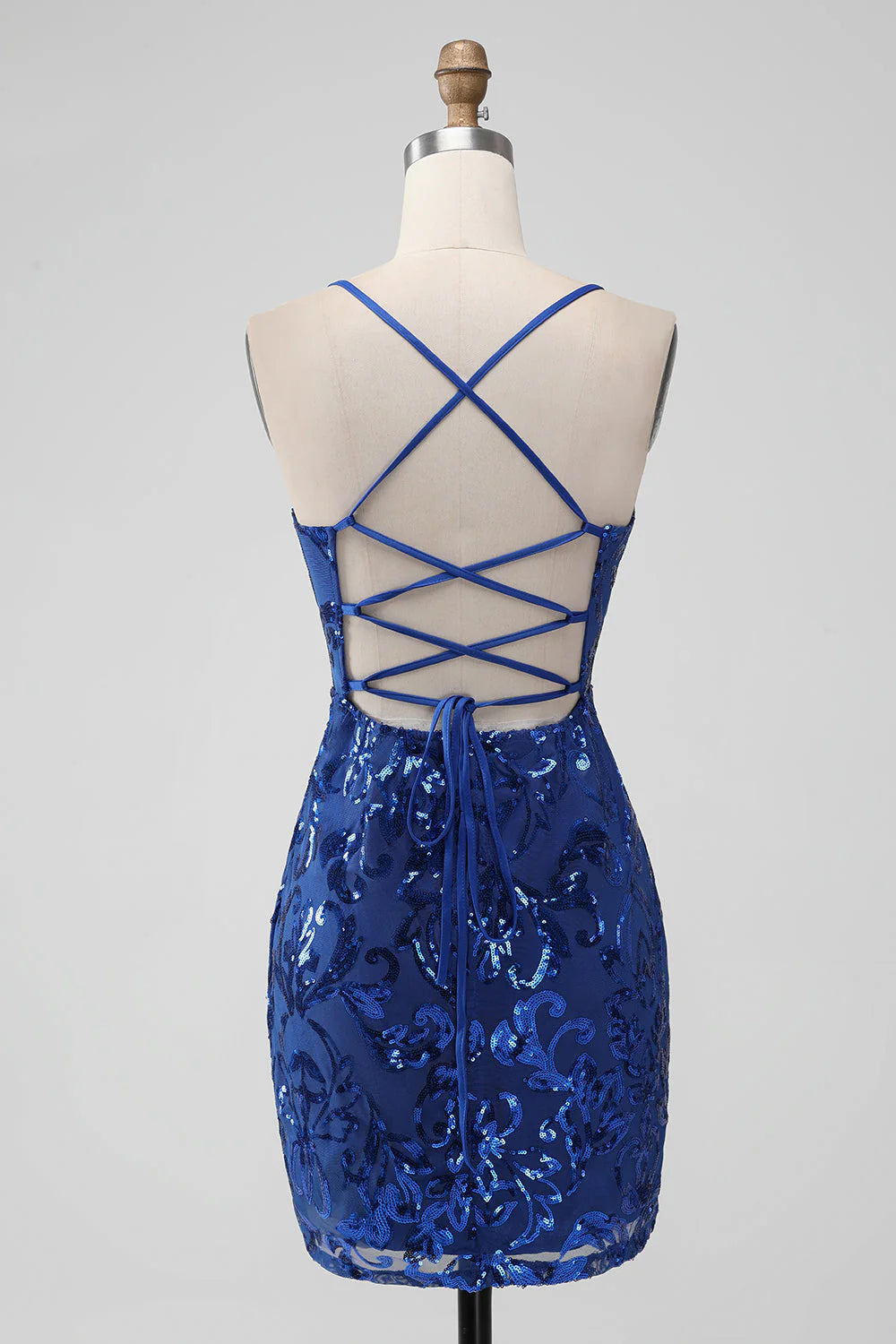 Side view of the Royal Blue Bodycon Sequins Short Homecoming Dress, showcasing sequin detail.