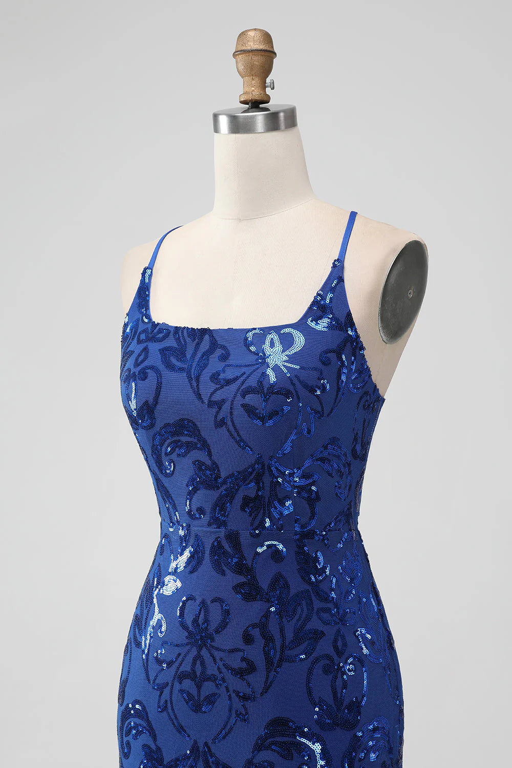 Back view of the Royal Blue Bodycon Sequins Short Homecoming Dress, highlighting the lace-up closure.
