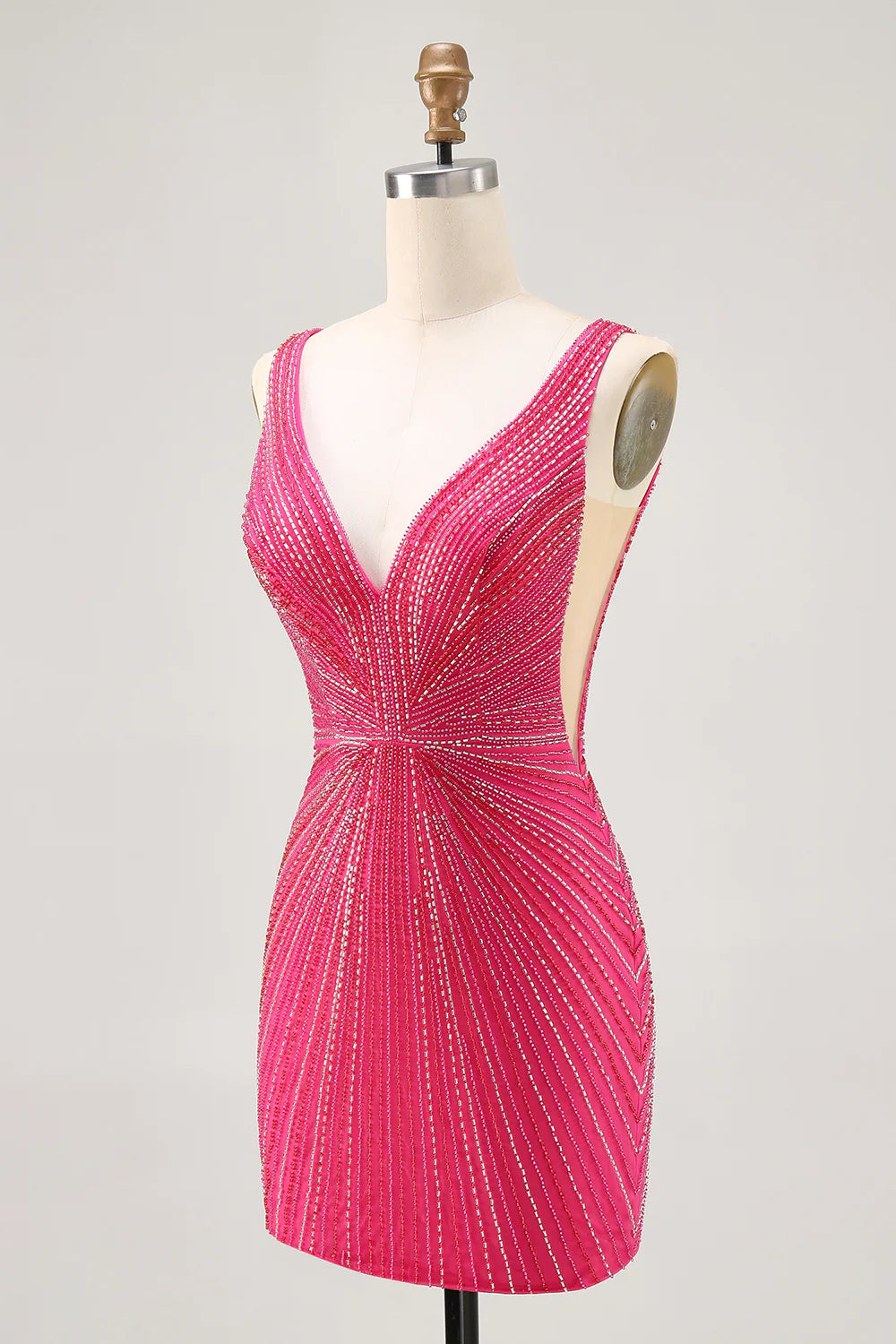 Fuchsia bodycon V-neck backless short homecoming dress with beading, back view.