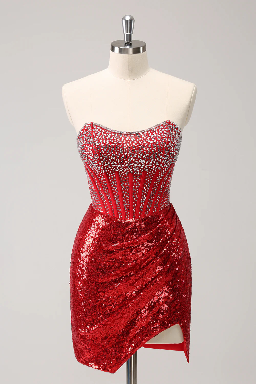 Red strapless sequin homecoming dress with a slit and beading.