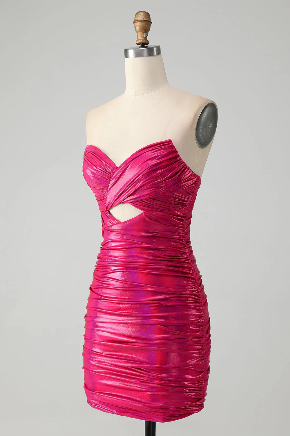 Side view of fuchsia form-fitting metallic homecoming dress.