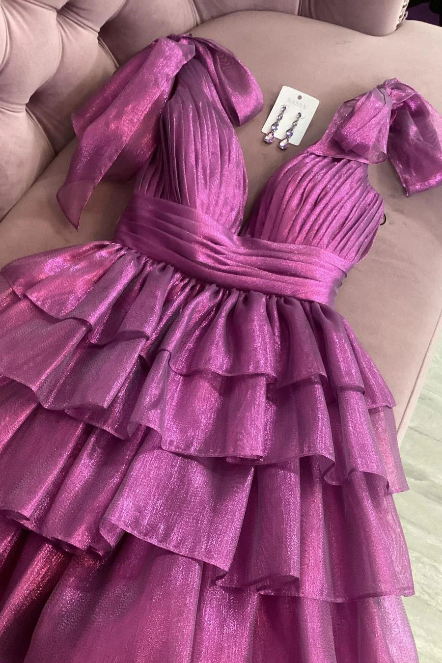 Another angle of the deep V-neck tiered short satin dress.