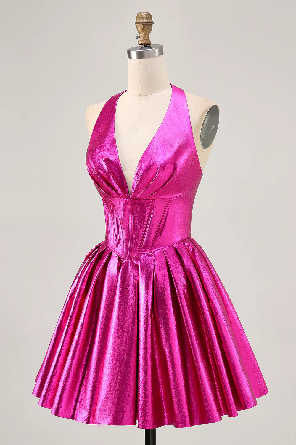 Back view of the fuchsia A-line halter dress, showcasing the elegant backless design.