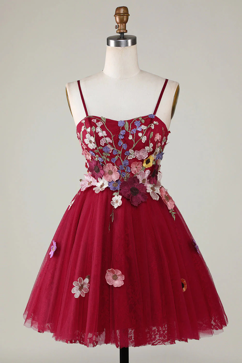 Burgundy A-line short homecoming dress with spaghetti straps and 3D flowers.