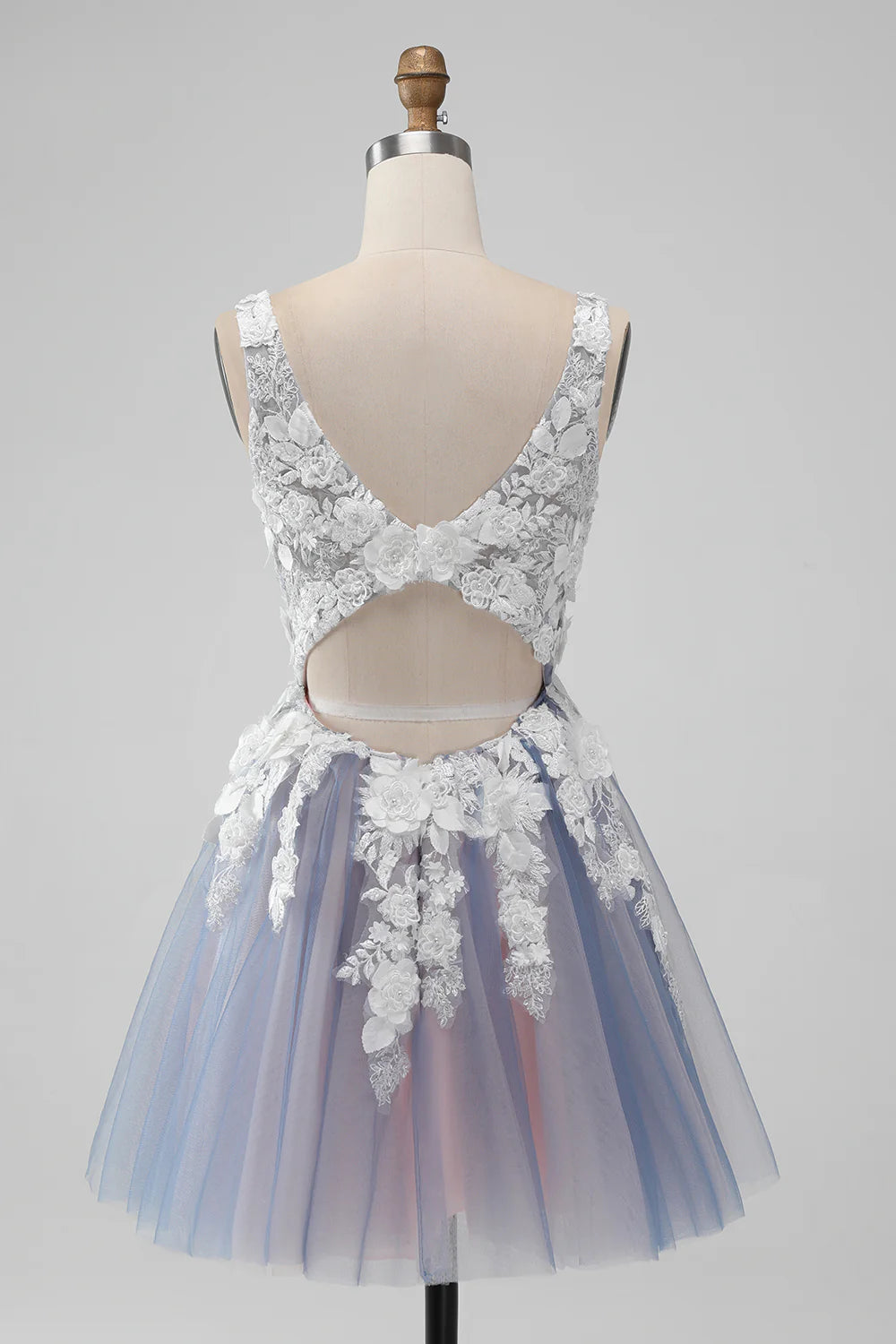 Close-up of floral and pearl embellishments on the grey pink homecoming dress.