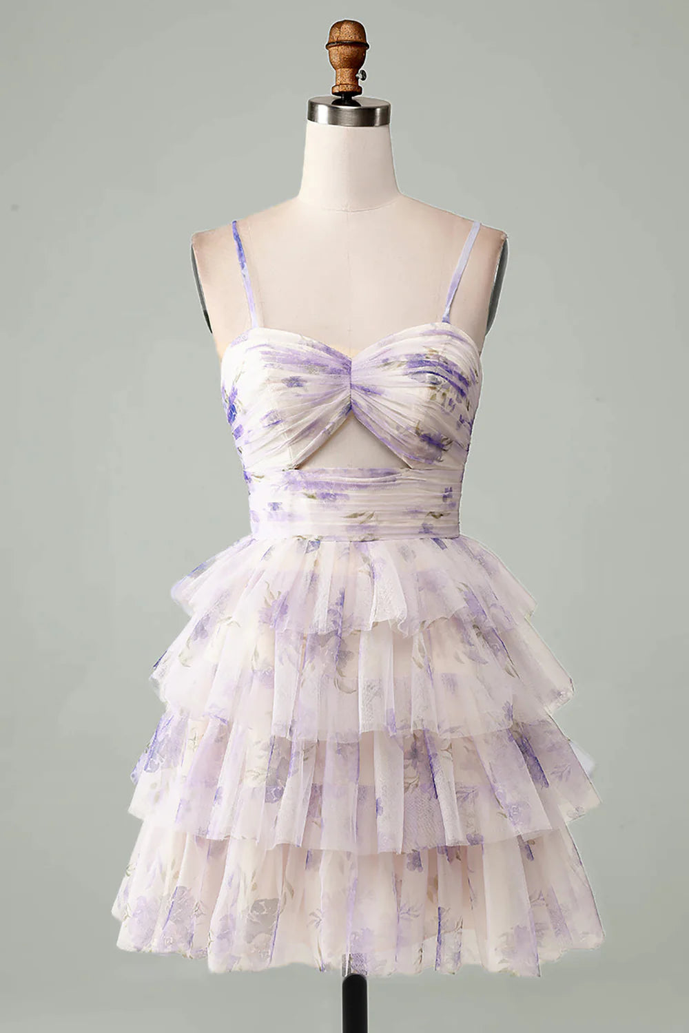 Lavender A-line homecoming dress with spaghetti straps and tiered skirt.