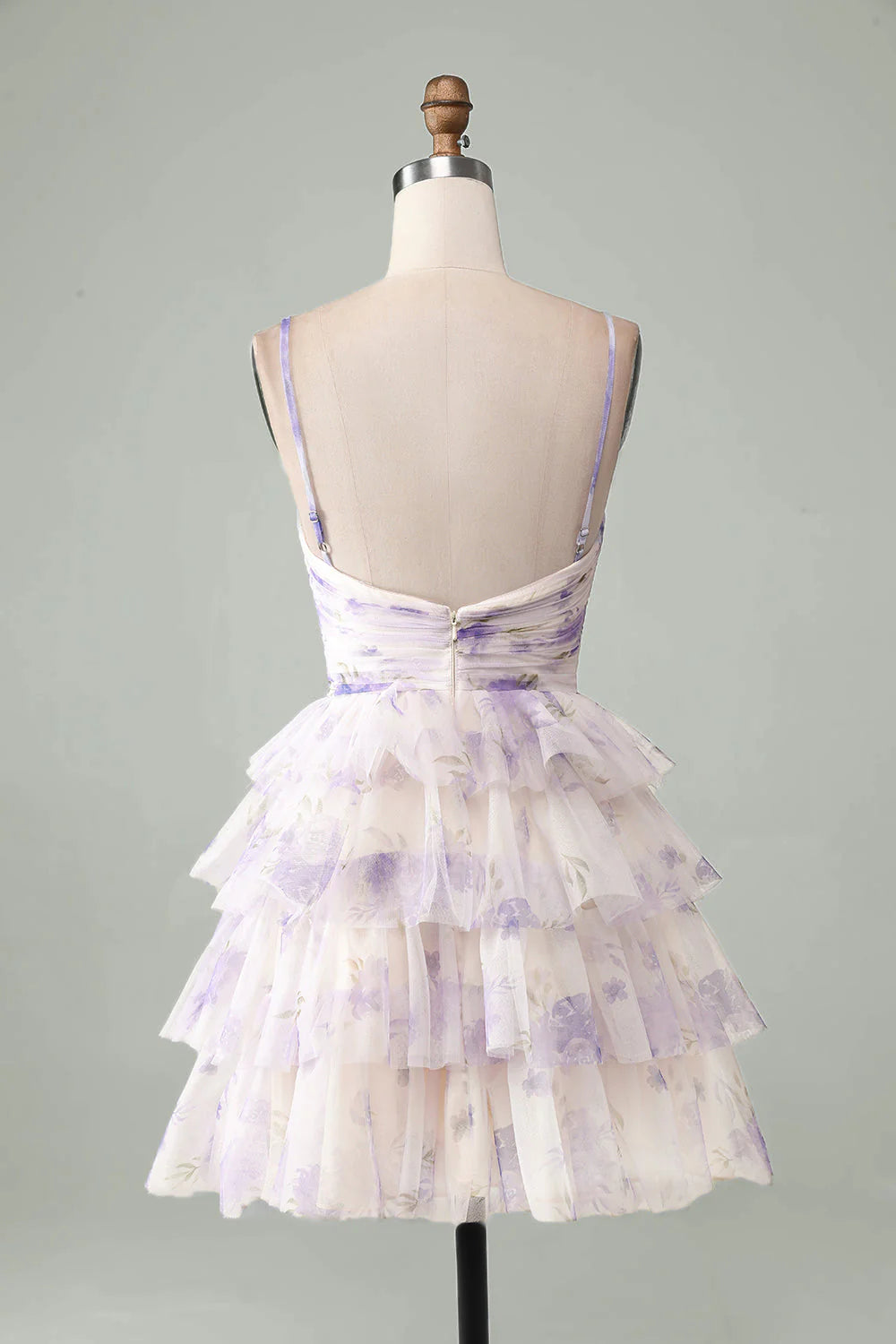 Side view of a lavender tiered homecoming dress.