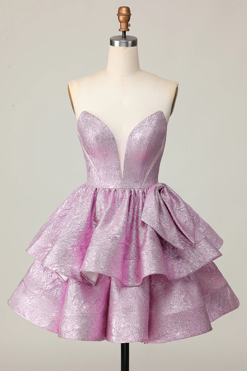 Light purple A-line strapless short homecoming dress with a bow.