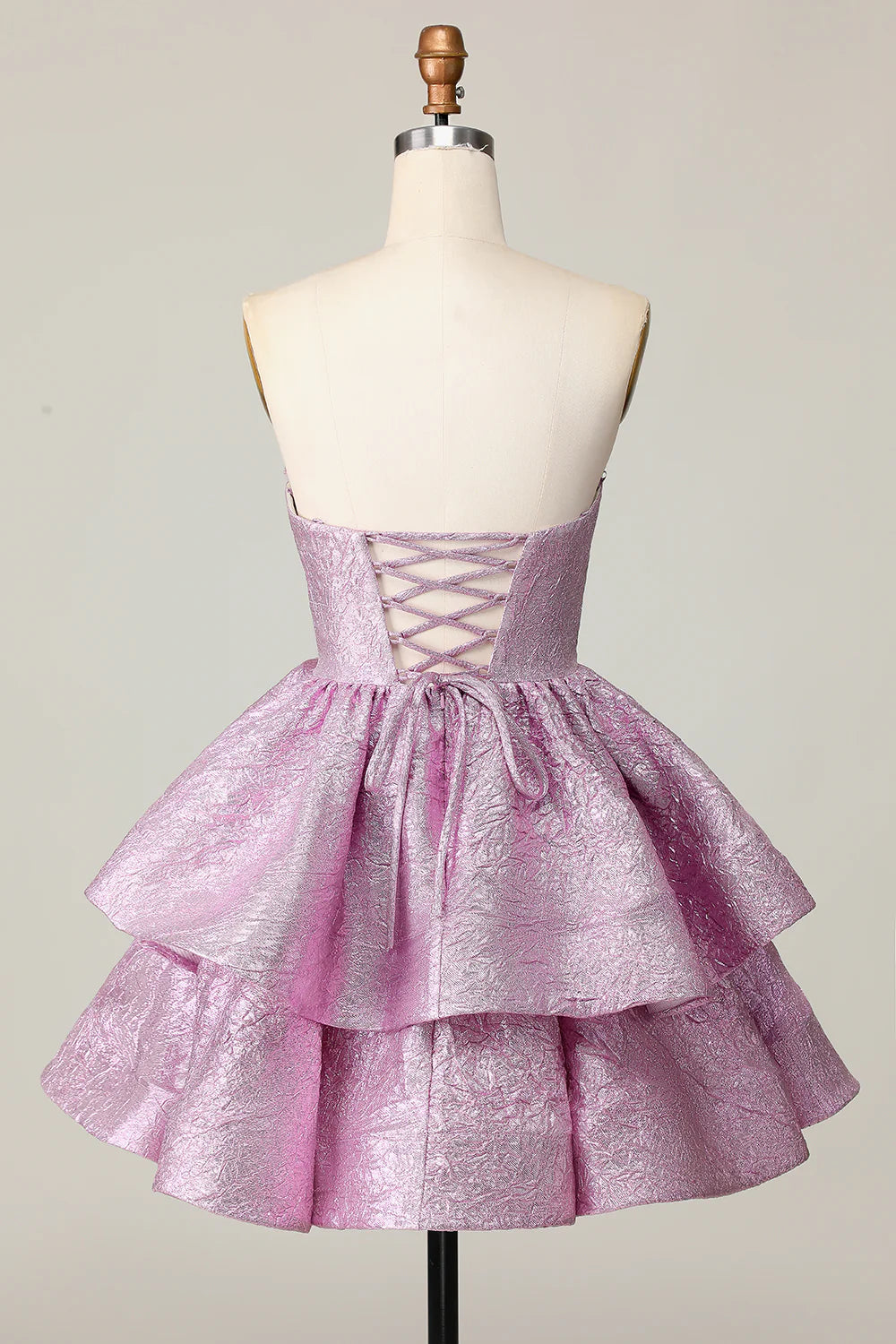 Back view of light purple A-line strapless short homecoming dress.