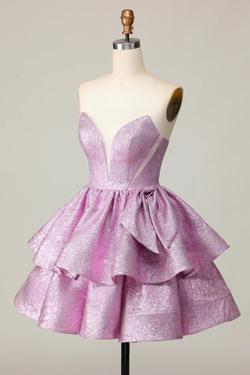 Side view of light purple A-line strapless short homecoming dress.
