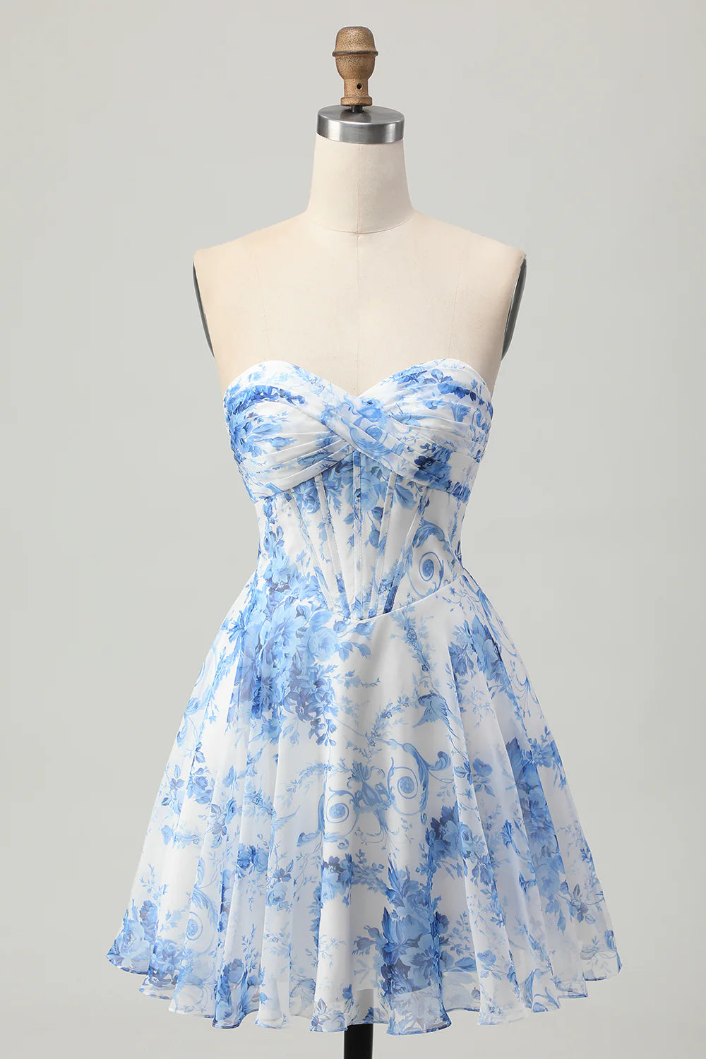 White and blue floral strapless A-line short homecoming dress with corset bodice.