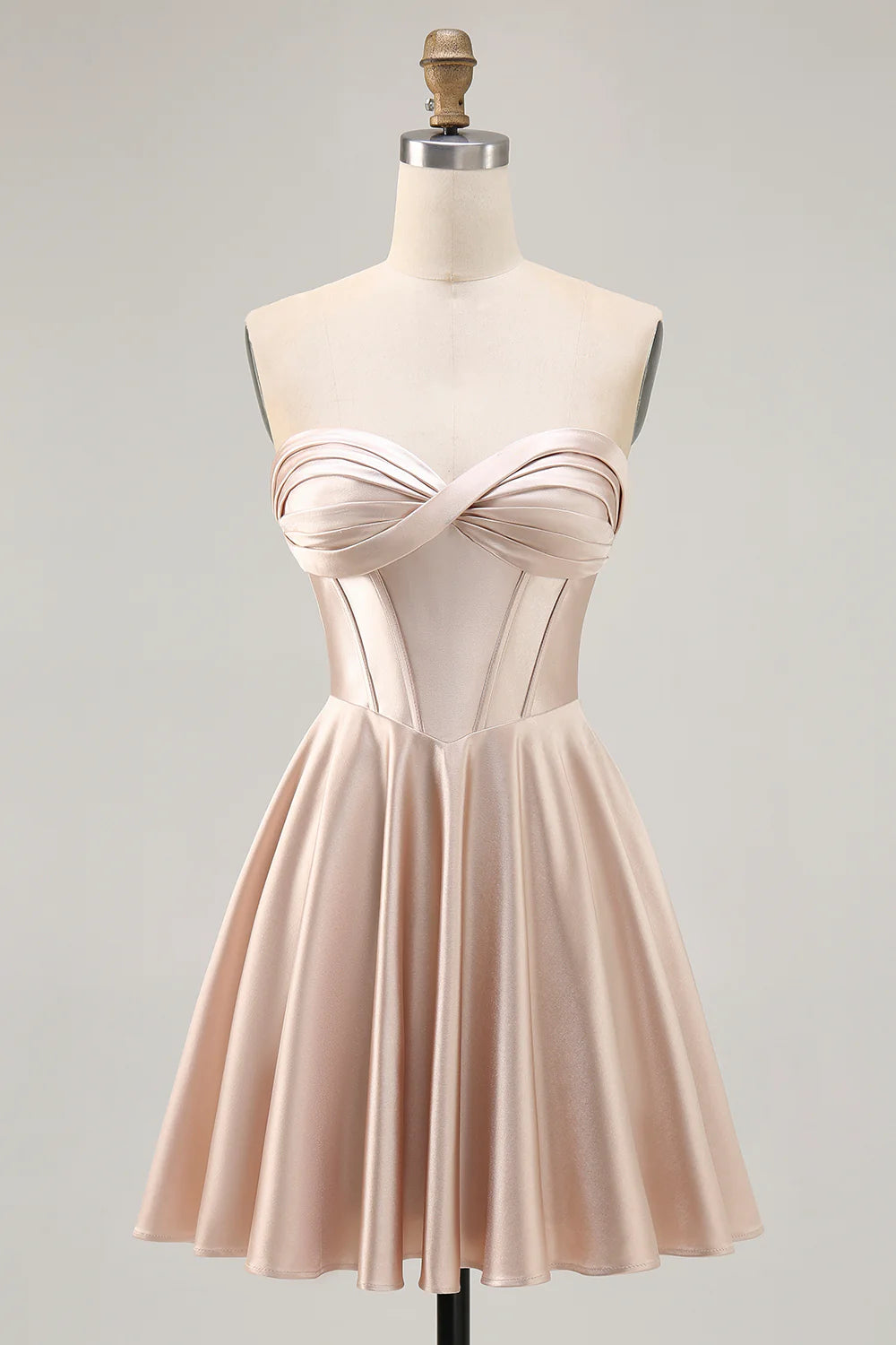 Champagne A-line strapless satin homecoming dress with corset and ruched details, front view.
