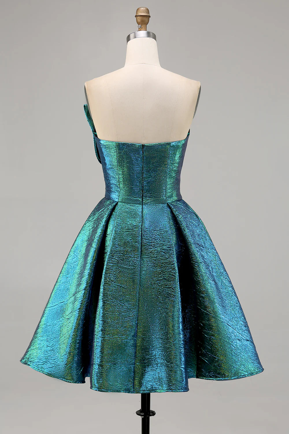 Back view of the peacock green strapless homecoming dress, highlighting the ruched corset.
