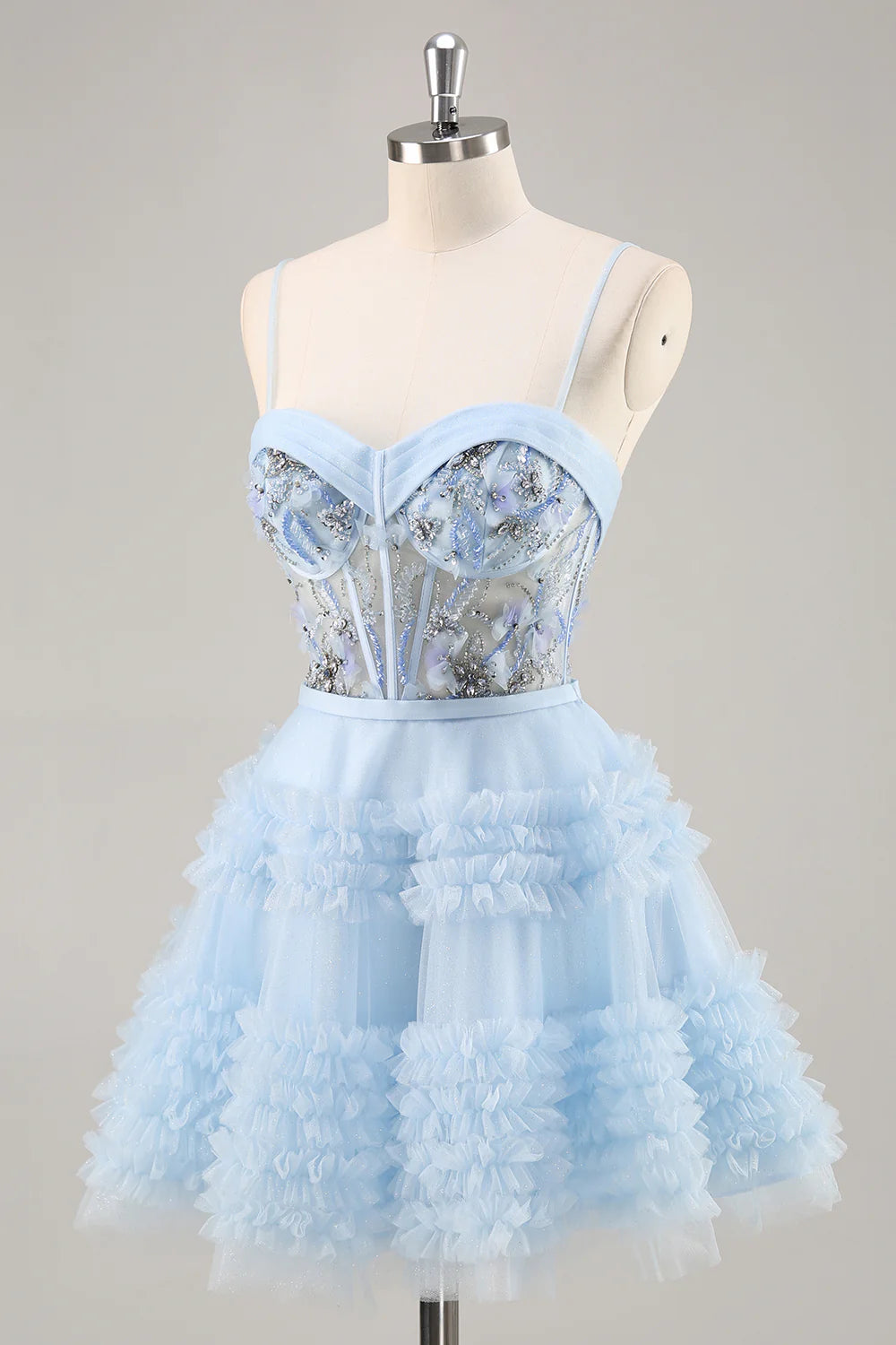 Back view of the blue A-line short homecoming dress with corset and ruffles.