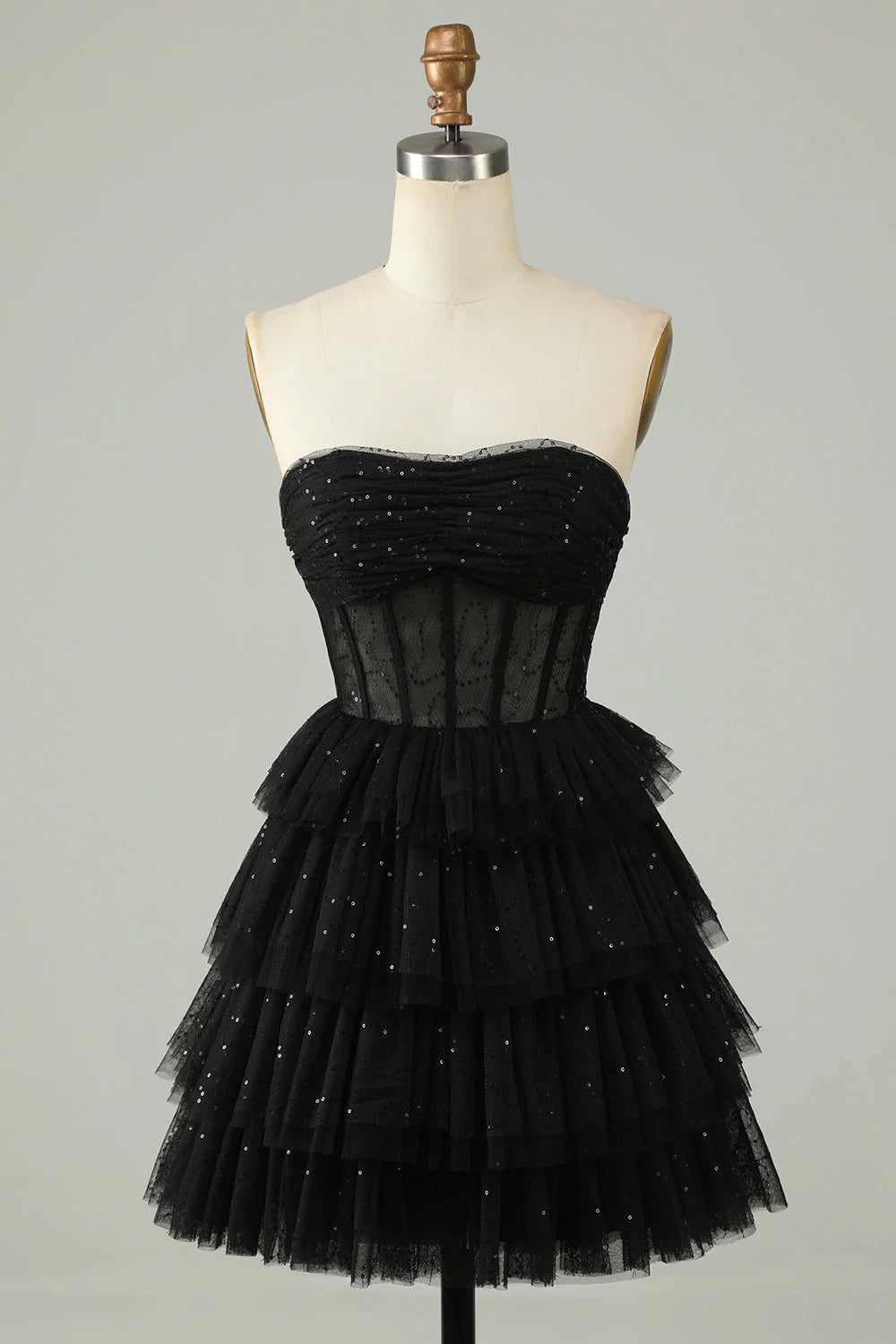 Black A-line strapless tiered corset homecoming dress.