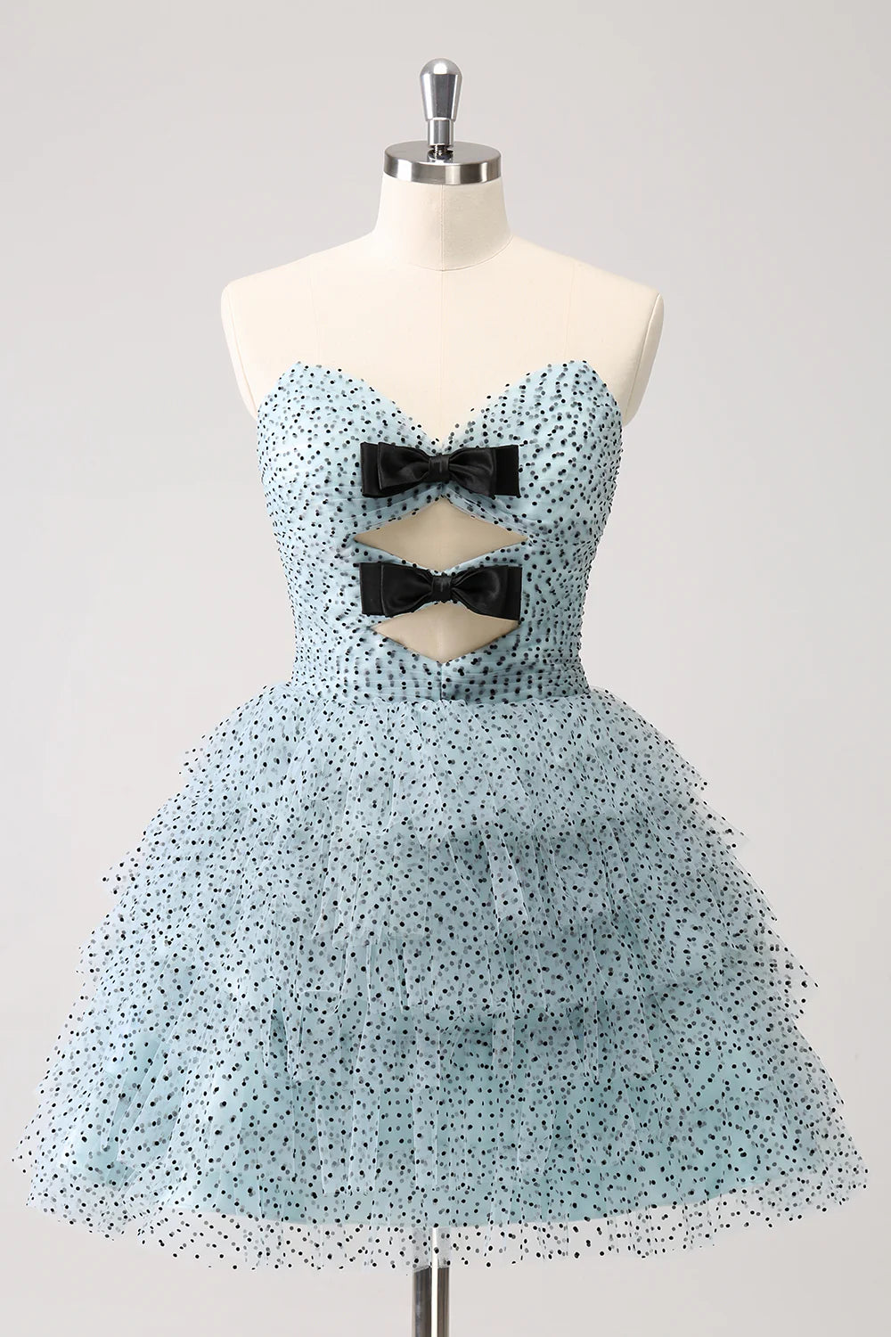 Blue A-line strapless homecoming dress with tiered ruffles and bows.
