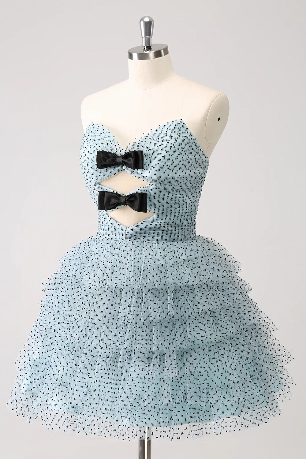 Side view of elegant blue tiered ruffle homecoming dress.