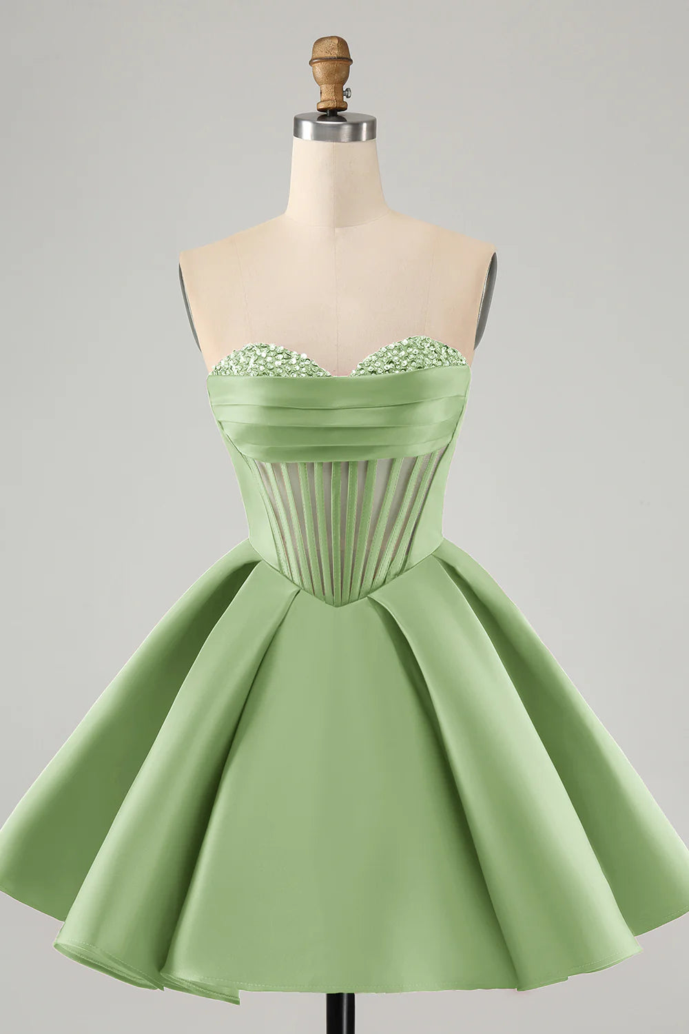 Green A-line sweetheart corset short homecoming dress with beading.