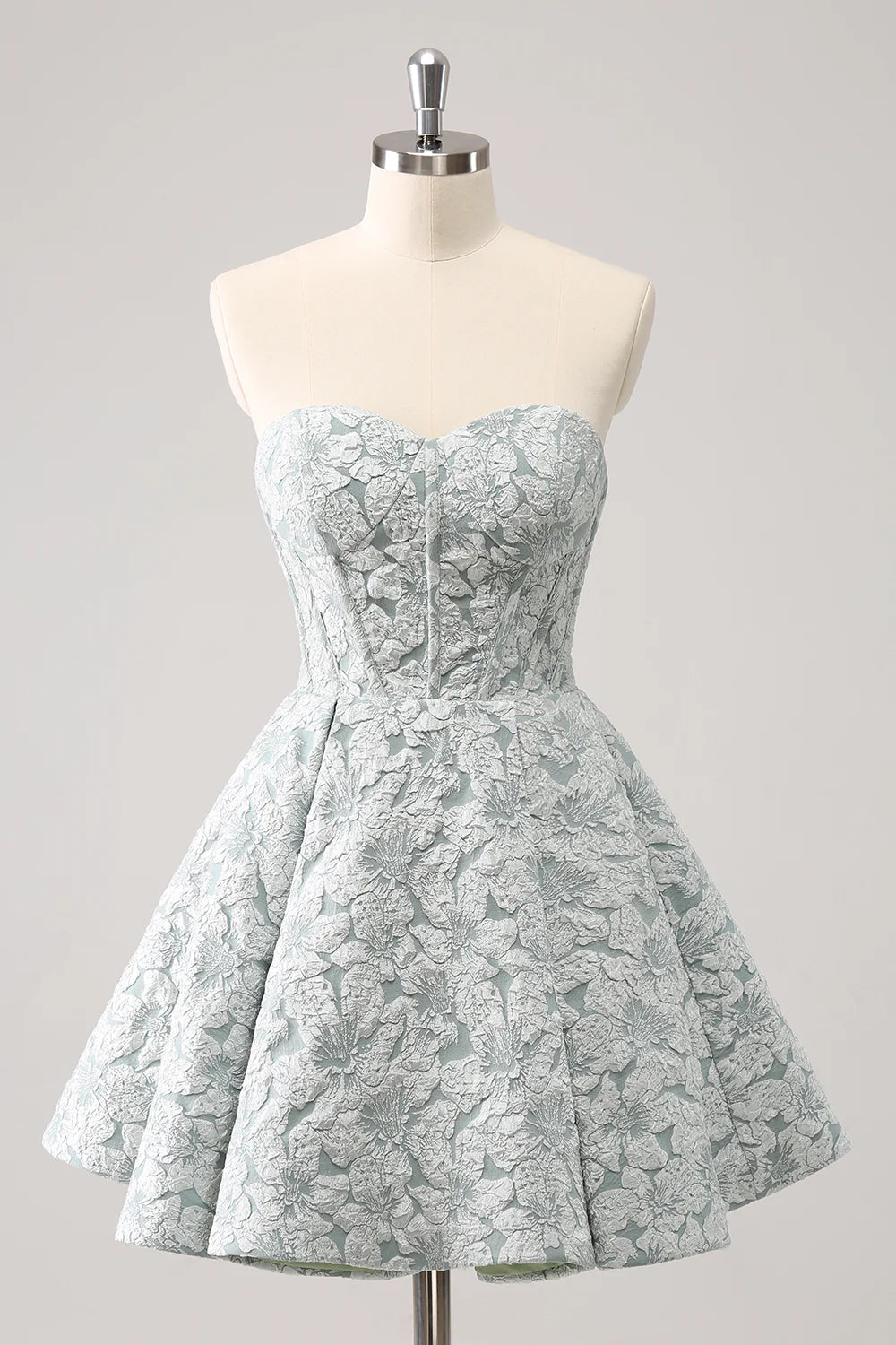 Grey green A-line sweetheart corset short homecoming dress on a model.