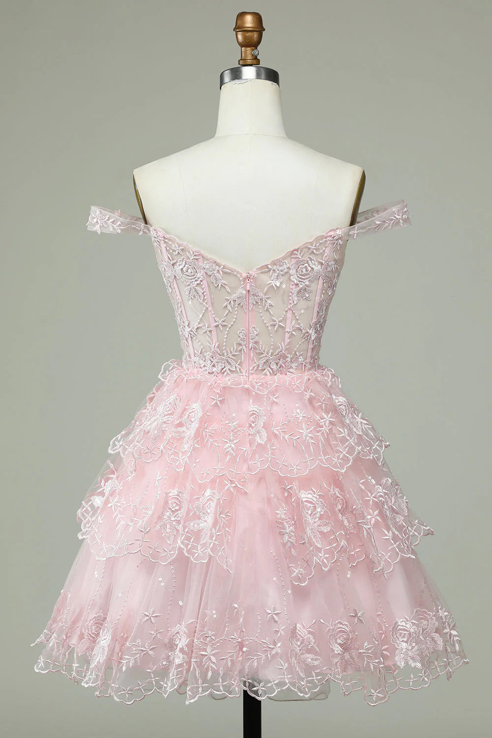 Close-up of the pink A-line short homecoming dress, showing bodice details.