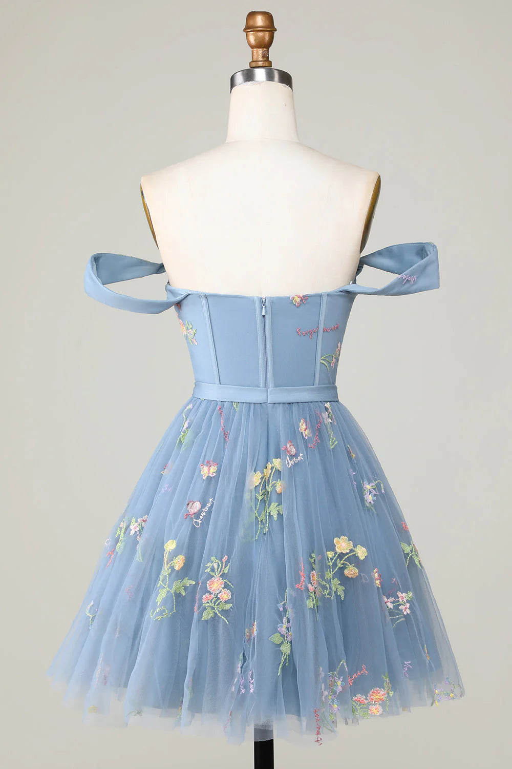 Close-up of the delicate embroidery on the grey blue A-line homecoming dress.