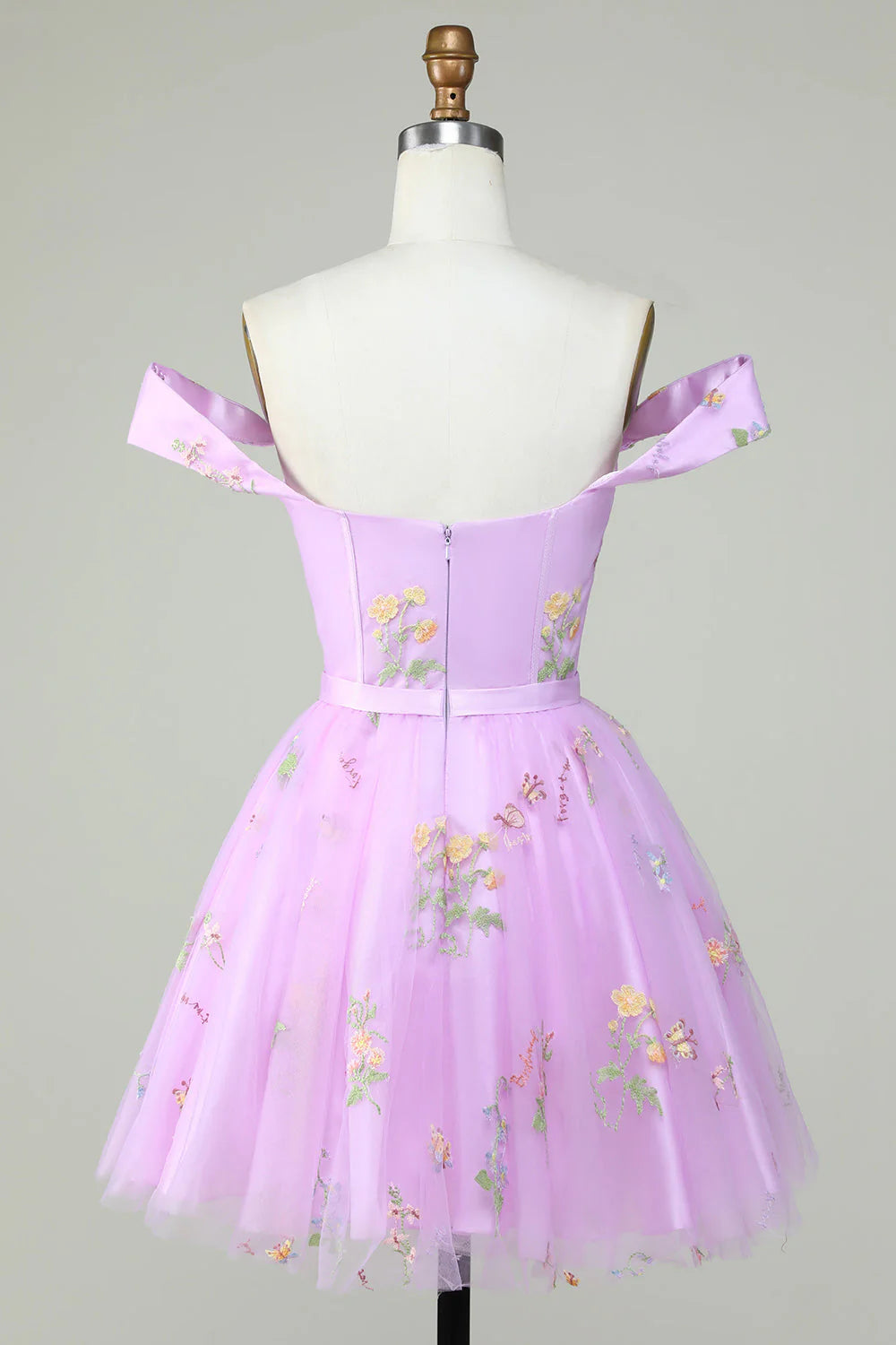 Side view of the purple A-line short homecoming dress, highlighting its silhouette.