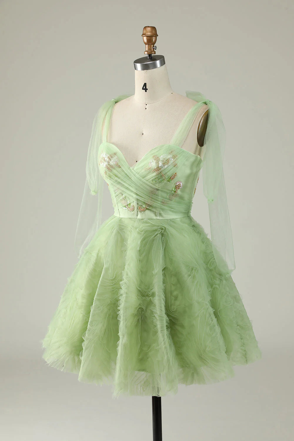 Strapless green short dress with A-line silhouette, perfect for homecoming events.