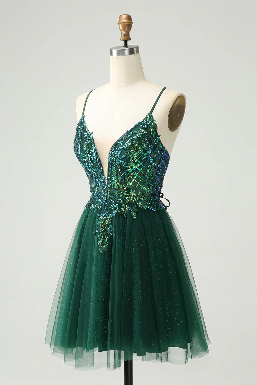 Back view of a dark green A-line V-neck sequin short homecoming dress with appliques.