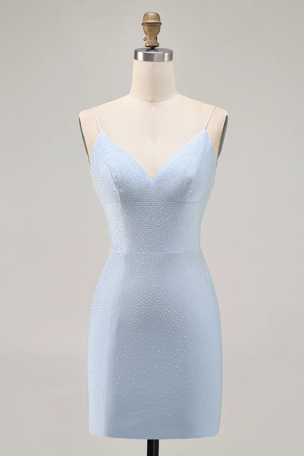 Blue bodycon backless short homecoming dress with intricate beading.