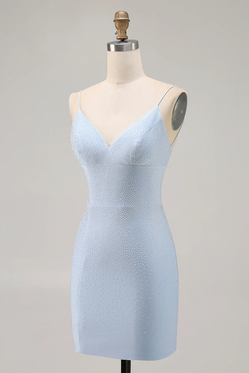 Side profile of the blue bodycon short dress, showing its fitted silhouette.