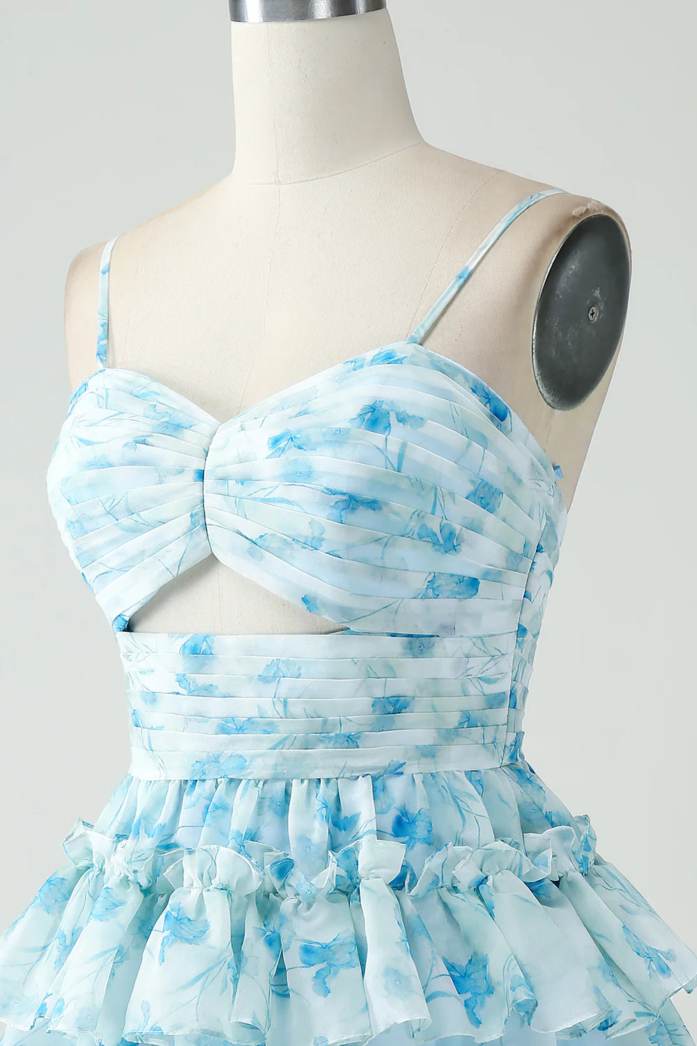 Another view of the blue floral A-line tiered pleated short homecoming dress.
