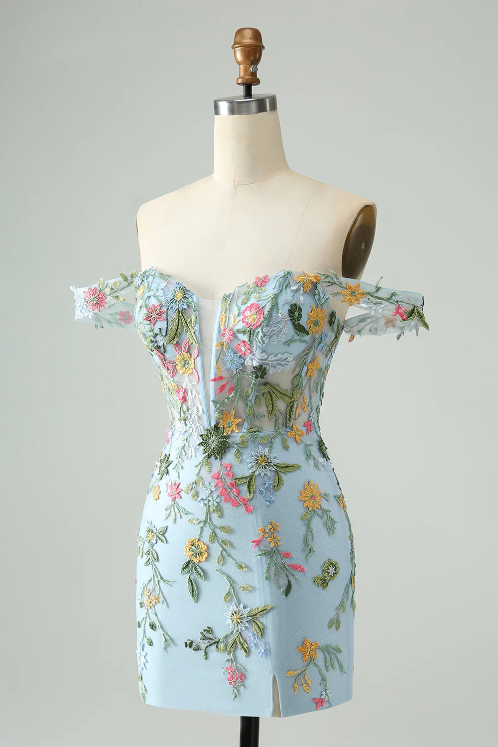 Front view of blue floral mermaid off-shoulder dress with intricate embroidery.
