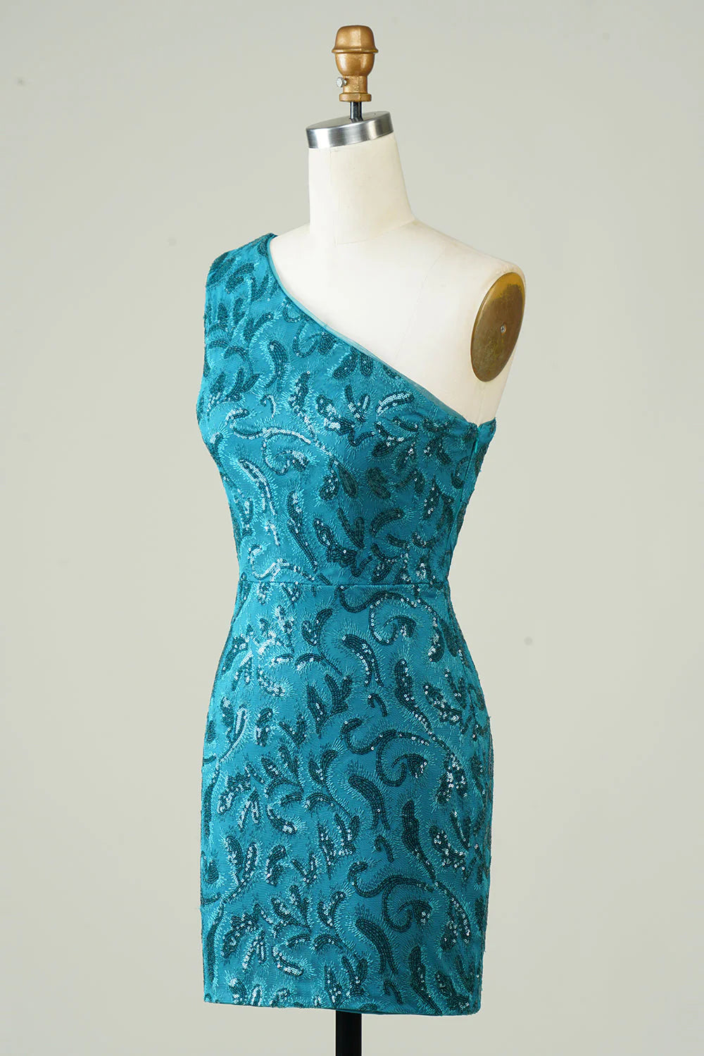 Side profile of a blue one-shoulder tight homecoming dress on a model.