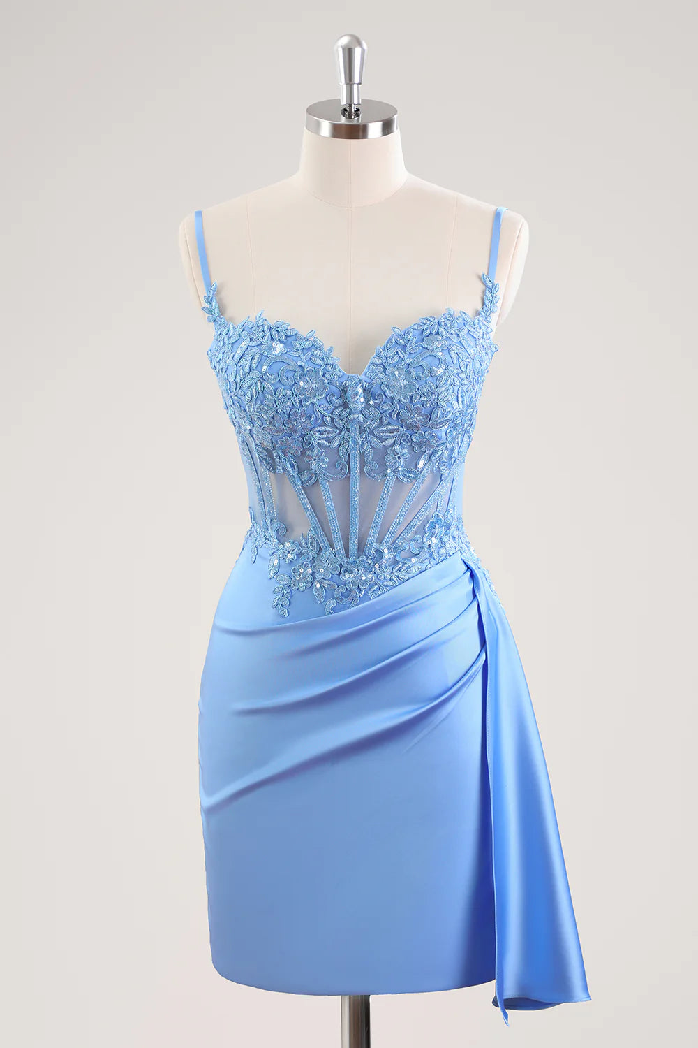 Blue sheath homecoming dress with sweetheart neckline, pleated corset, and beading.