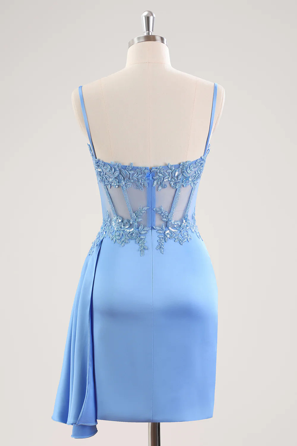 Back view of a blue pleated corset homecoming dress.