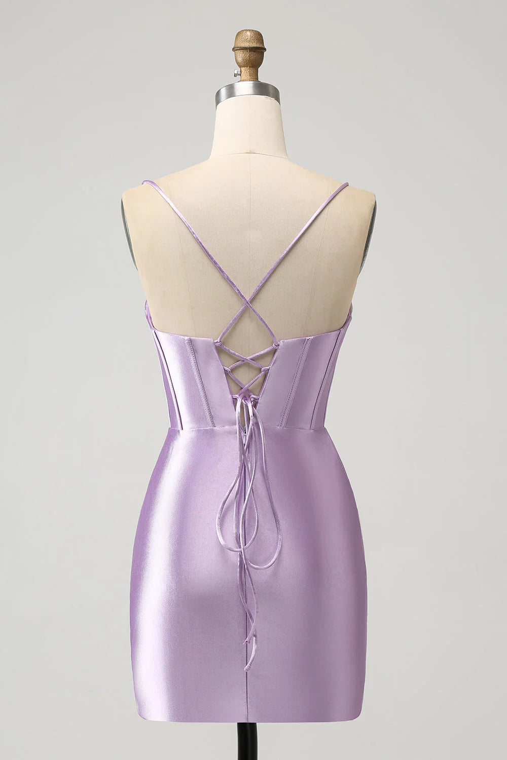 Back view of a lilac bodycon satin short dress, showcasing the corset lacing.