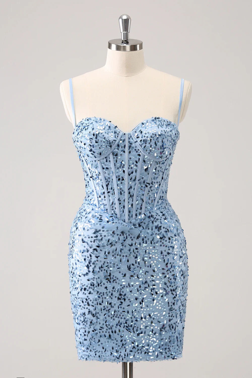 Front view of a blue bodycon short homecoming dress with spaghetti straps and sequins.